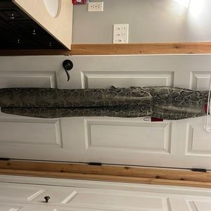 Jennifer Lopez snake print jumpsuit extra small.